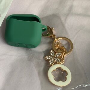 Elegant Green AirPods Holder with Gold Accents